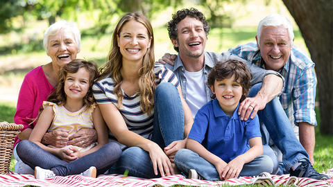 Grandparents, parents and kids together outside