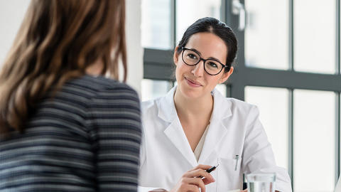 Doctor talking to patient