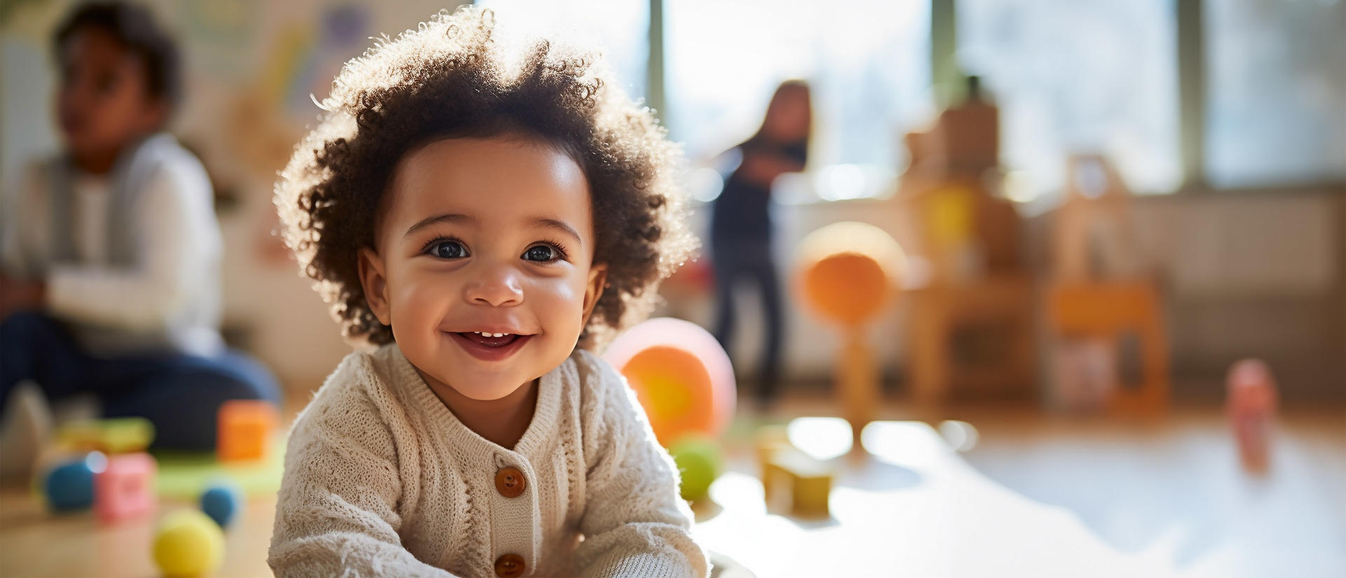 Young child smiling at a child care center
