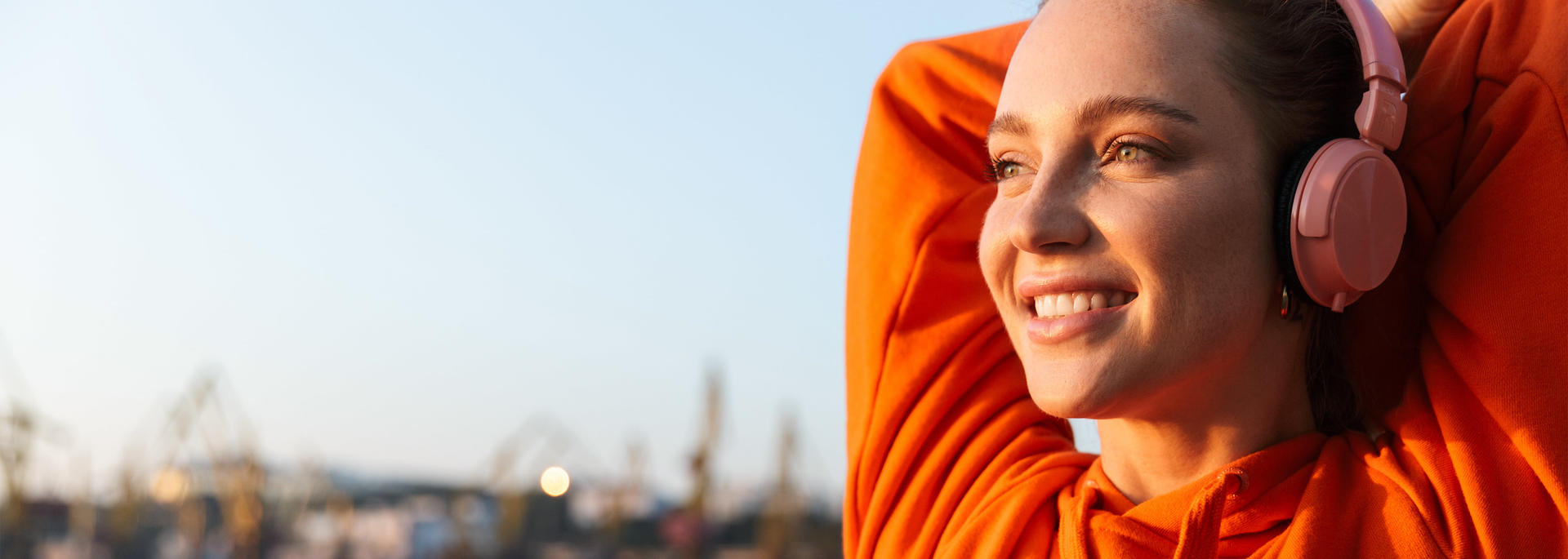 Woman stretching while walking outside